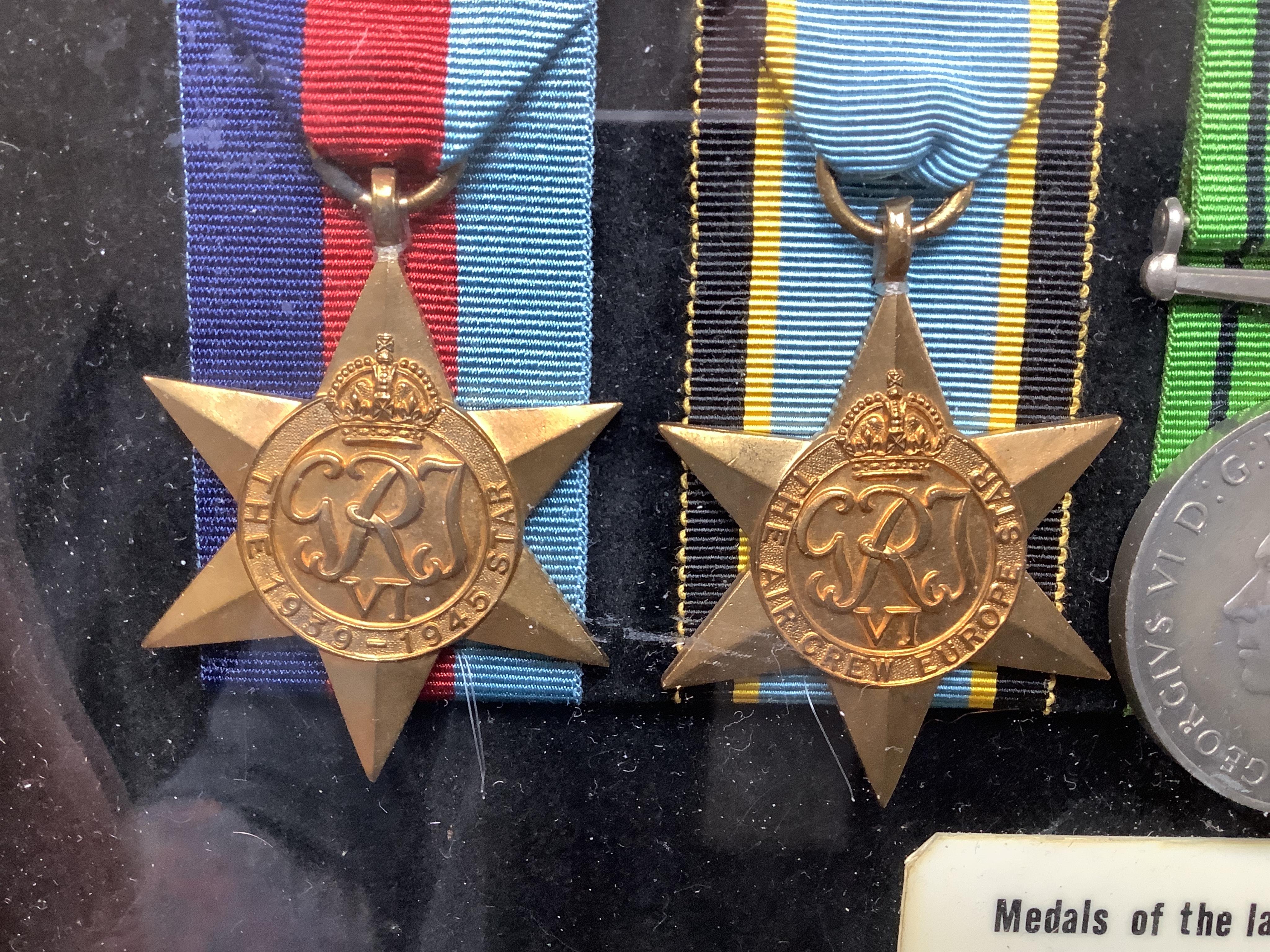 A framed WWII RAF medal group awarded to Wing Commander Brian Robert Noble, comprising;, The 1939-1945 Star, with clasp for the Battle of Britain, The Air Crew Europe Star, The Defence Medal, The British War Medal, The 1
